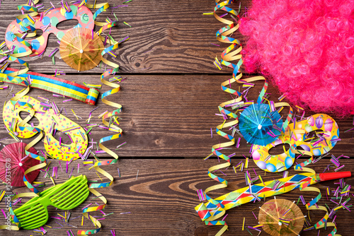 Colorful party background on wooden table
