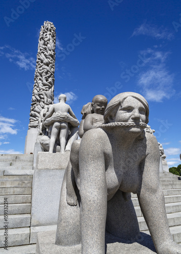 Vigeland's Monolith and statues Wheel of Life at the Vigeland Sculpture Park (Frogner Park), Oslo, Norway.