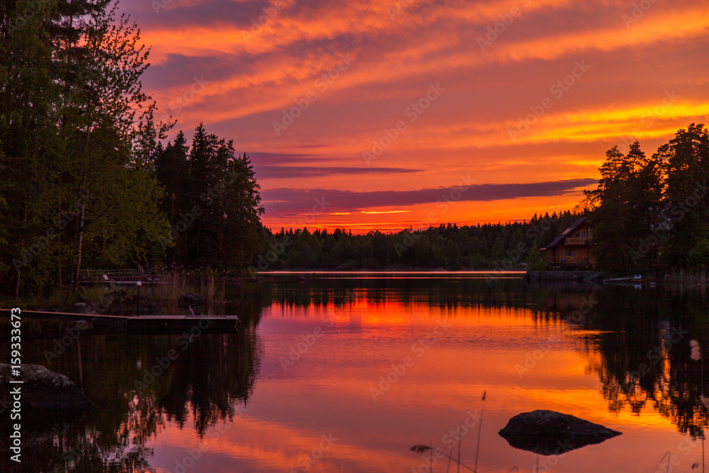 Colorful sunset on the lake in Karelia 