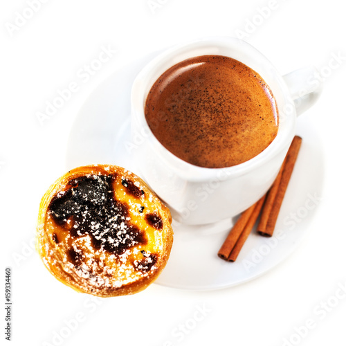 Coffee cup with egg tart dessert isolated on white background close up. Americano. Coffee cup of cappuccino with brown foam