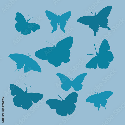 Blue silhouettes of butterflies on a gray background. A flat vector image of a silhouette of butterflies. Butterfly logo. Set of elegant butterflies