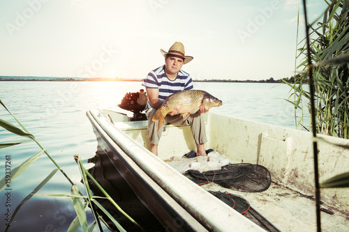 Fisherman Holding a Big Fish