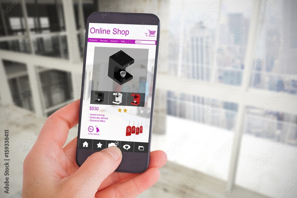 Composite image of female hand holding a smartphone Composite image of female hand holding a smartphone