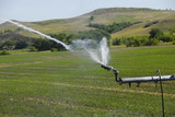 Center pivot irrigation system operating in North Dakota.