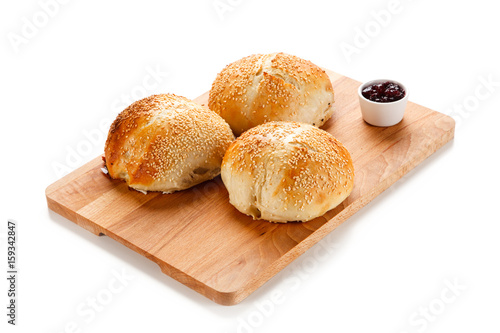 Fresh baked buns on white background 