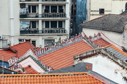 Chinese style roofs with modern buildings in Kualar Lumpur, Malaysia. photo