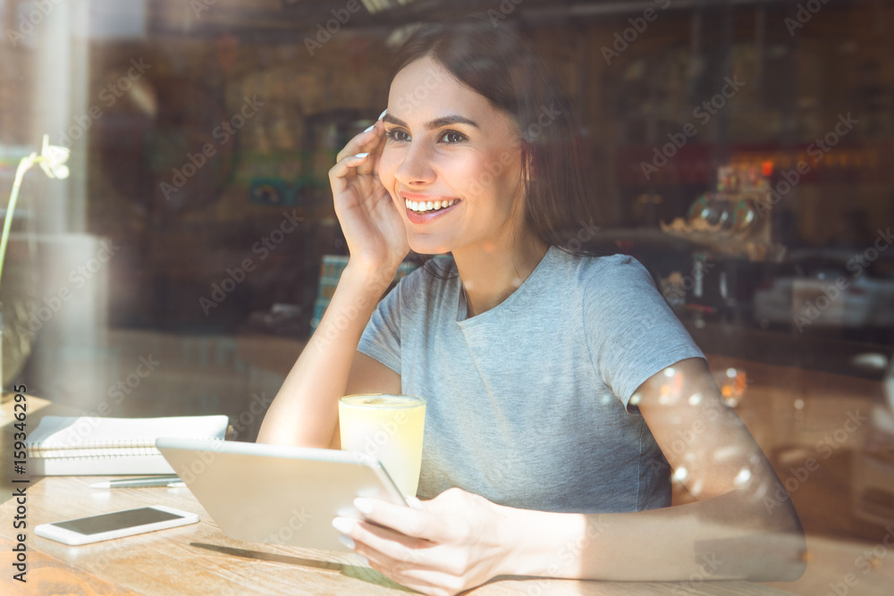 Young woman sitting in a coffee shop leisure Young woman sitting in a coffee shop leisure