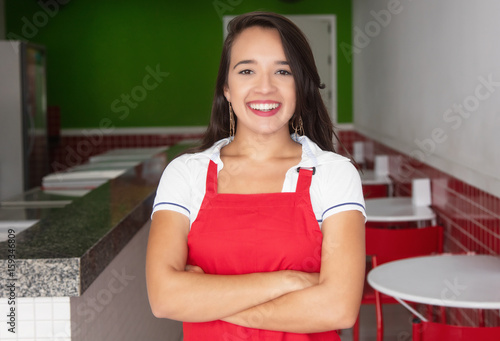 Free Download Laughing caucasian waitress in a fast food restaurant - GFXLoad