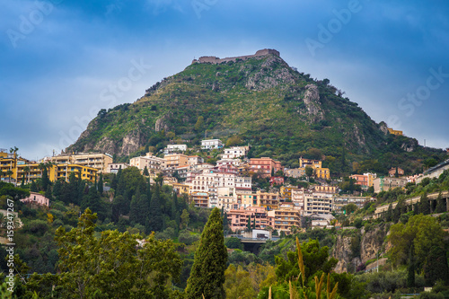 Taormina, Sicily - The castle of Monte Tauro Taormina Castelmola and sanctuary Madonna of the fort with blue sky