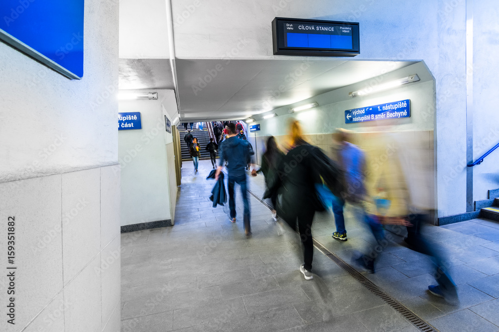 Fototapeta premium Movement in the railway subway. People rushing home from the train station.