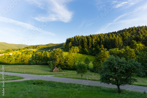 Intersection in the black forest at sunset with blue sky