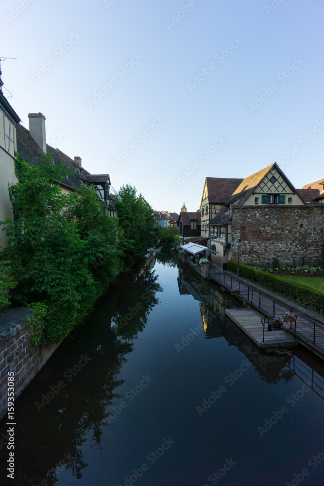 Dawn at the canal of little venice in Colmar with historic houses