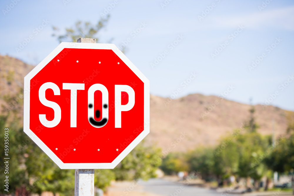Stop Sign with Smiley Face
