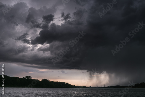 The storm and rain are coming to the river