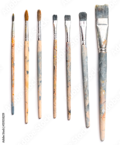 Different used art brushes isolated on white background