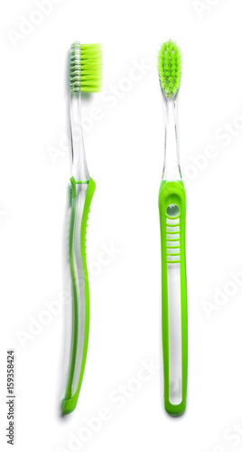 Used toothbrush from the top and from the side isolated