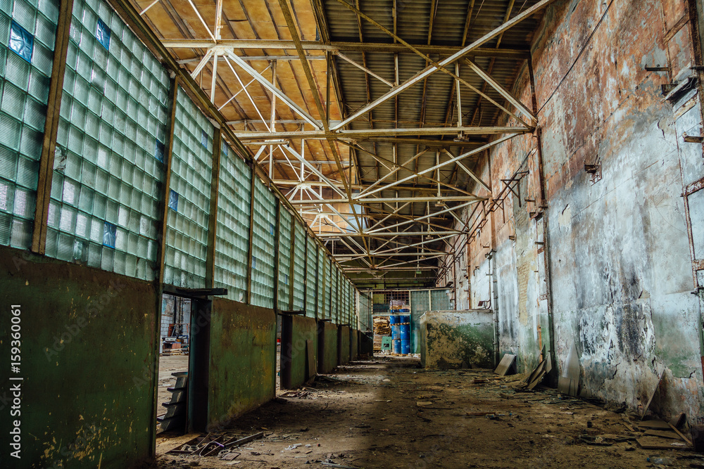 Abandoned ruins of Voronezh factory of radio components, corridor with glass block wall Abandoned ruins of Voronezh factory of radio components, corridor with glass block wall