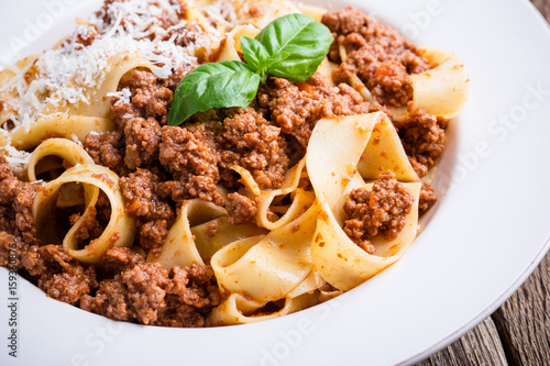 Vászonkép Homemade  traditional Italian pasta pappardelle bolognese