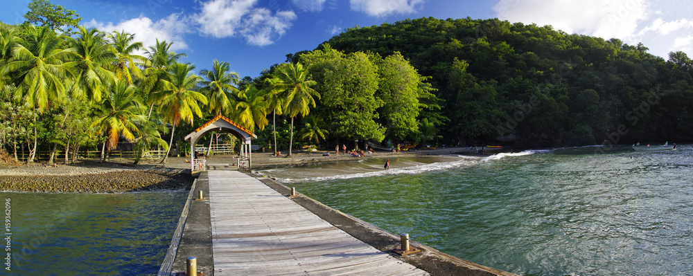 Fototapeta premium ANSES d'ARLET, MARTINIQUE: JANUARY 2 - Anse Noire in Martinique on January 2, 2017, landscape of Les Anses d Arlet, France, Lesser Antilles