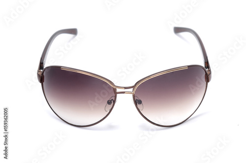 Sunglasses in an iron frame with brown glass isolated on white