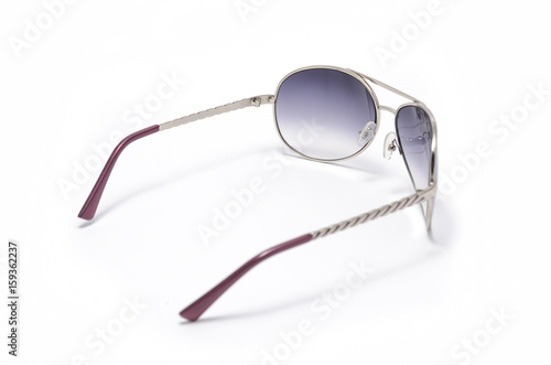 Sunglasses in purple iron frame isolated on white