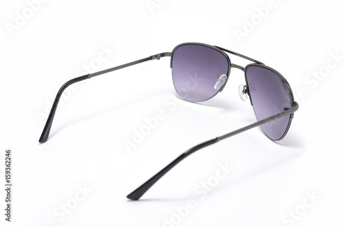 Men's sunglasses in metal frame with purple glass isolated on white