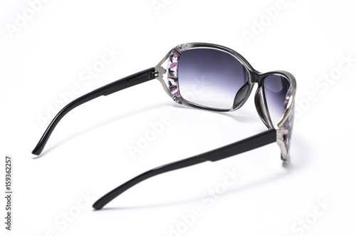 women's sunglasses with purple glass isolated on white