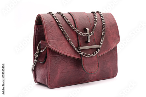 burgundy leather clutch with chain isolated on white