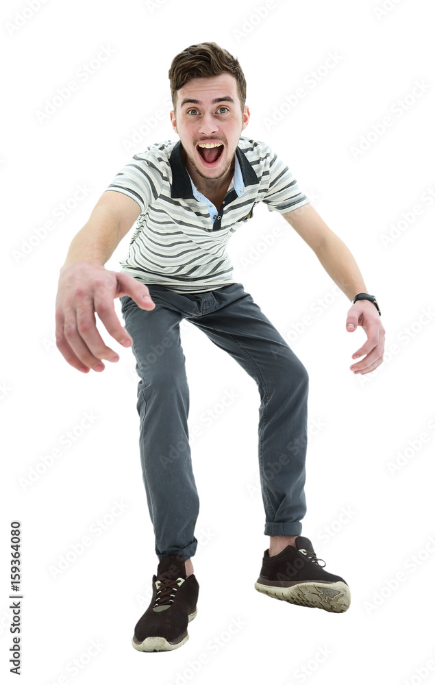 Young man celebrating his success over white background Young man celebrating his success over white background