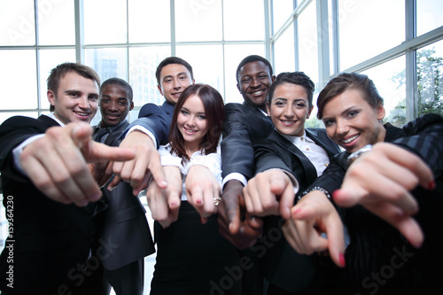 Fotografie Large group of multiethnic business people pointing their finger