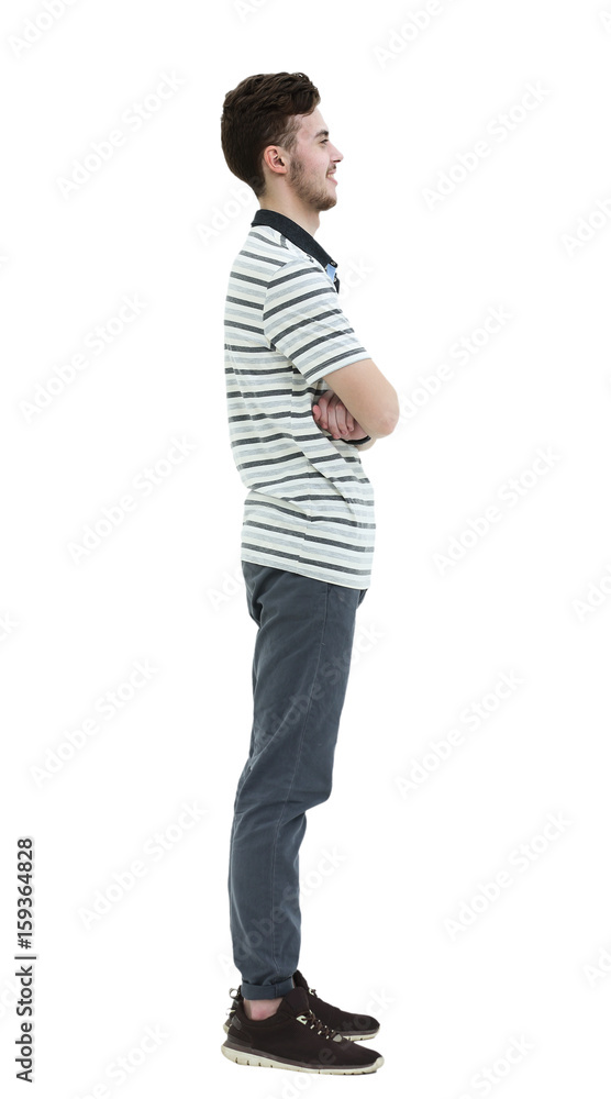 Young man standing sideways isolated on white background Young man standing sideways isolated on white background