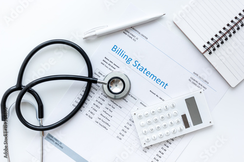 health care billing statement with doctor's stethoscope on white background top view mock-up