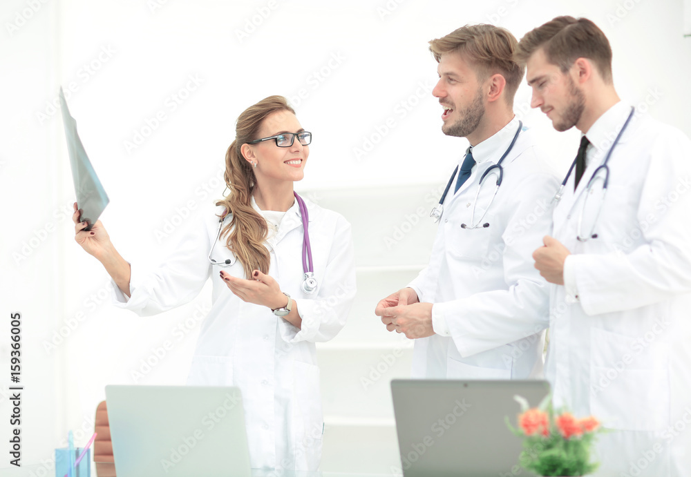 Team of medical professionals working at the medical office. Team of medical professionals working at the medical office.