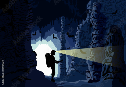 Vector girl caver in cave with stalactites and stalagmites and bats