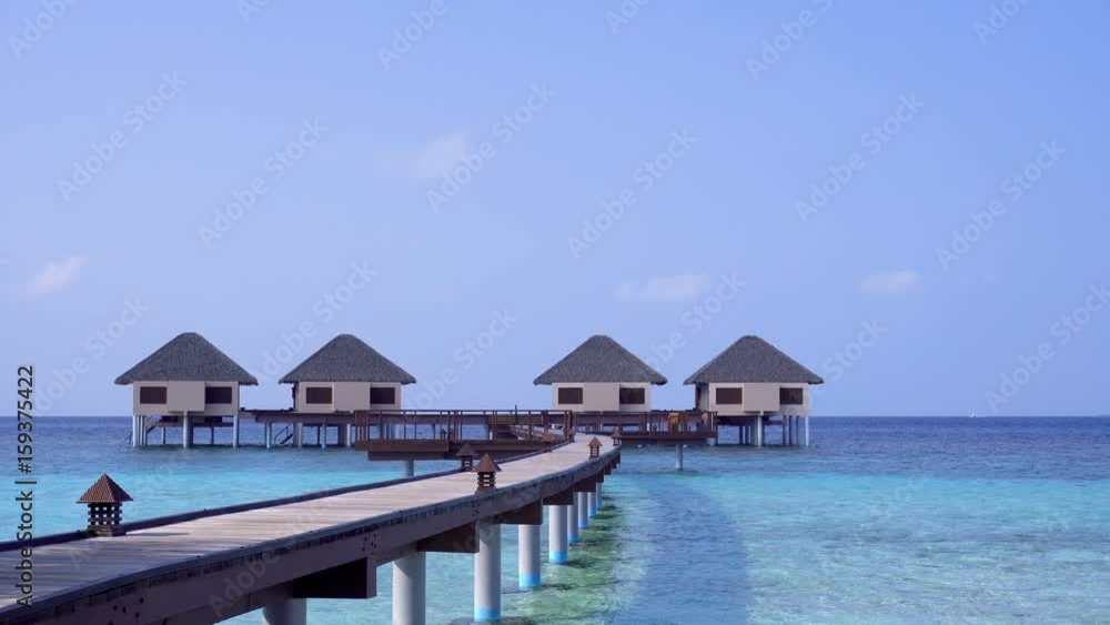 Tropical travel card with pristine beach and water bungalows at maldivian island
Tropical travel card with pristine beach and water bungalows at maldivian island