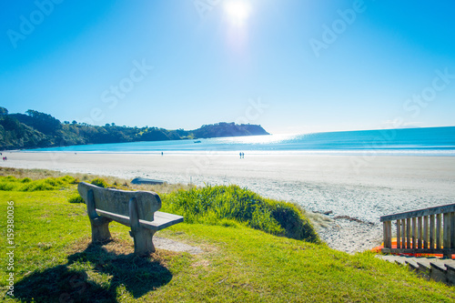 Beautiful view from top in a Waiheke Island, New Zealand with a beautiful blue sky and a white sand in a sunny day