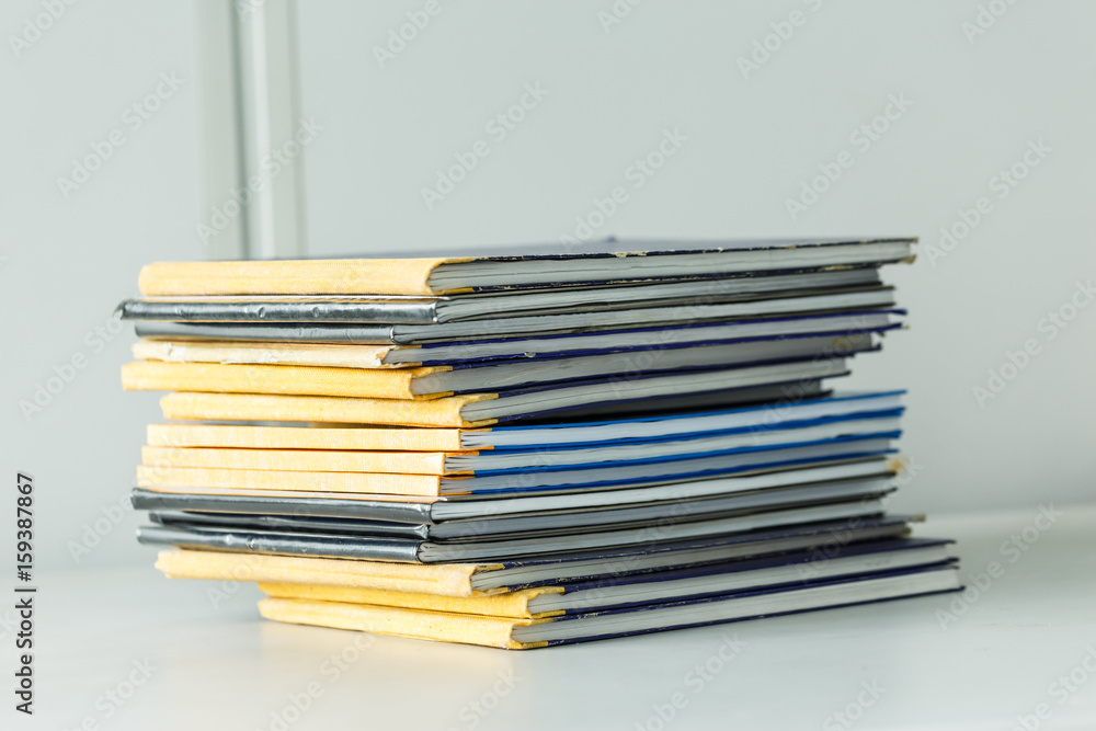 Many old books in a pile Many old books in a pile