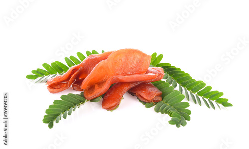 Tamarind soaked in syrup on white background