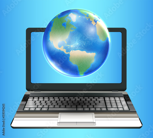 planet earth globe floating on laptop computer