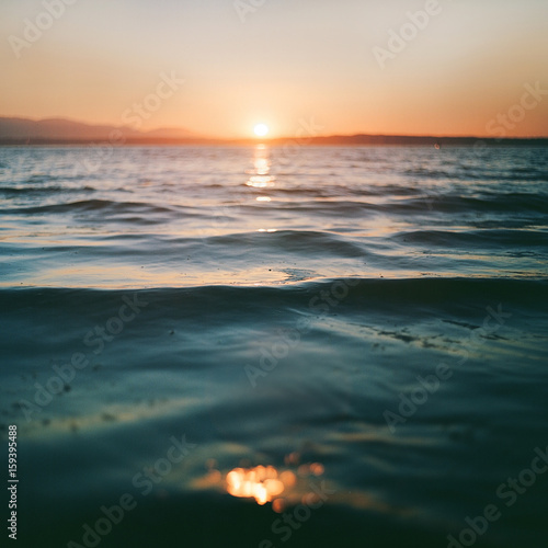 Calm water at the sunset
