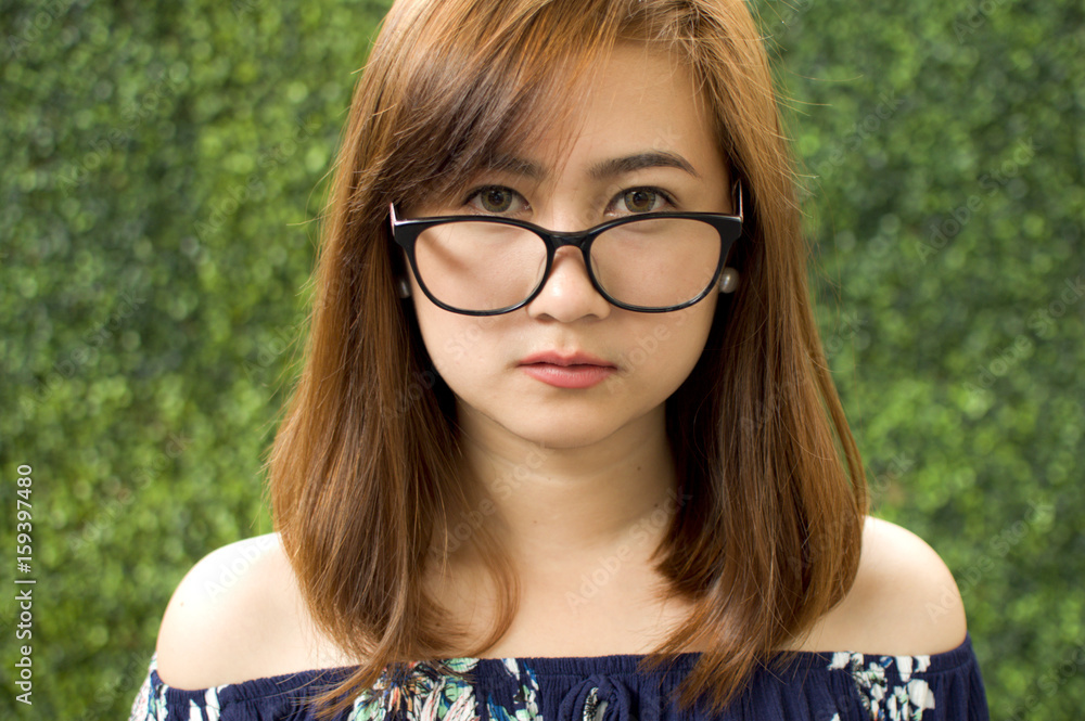 A portrait of a woman with eyeglasses A portrait of a woman with eyeglasses