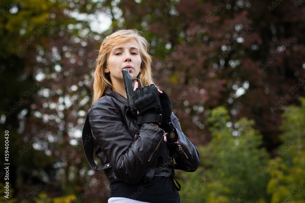 Nice girl with arms in autumn day Nice girl with arms in autumn day
