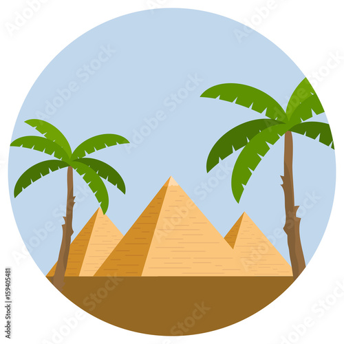 Egyptian pyramids with palm trees and desert against the blue sky