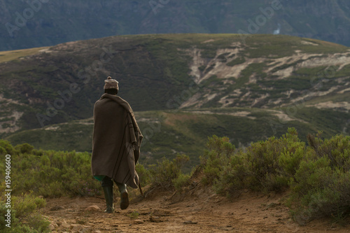 african man looking over mountain