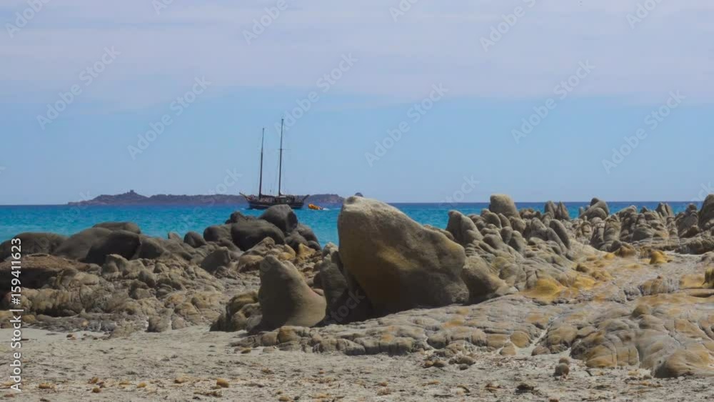 Sailing Ship and Scenic Sardinia Italy Mediterranean Sea Bay with Rocks Sailing Ship and Scenic Sardinia Italy Mediterranean Sea Bay with Rocks