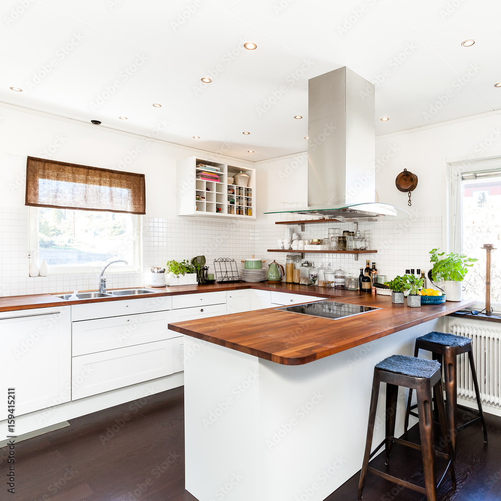 Fototapeta premium kitchen interior with wooden ktichen counter top and dark wooden floor
