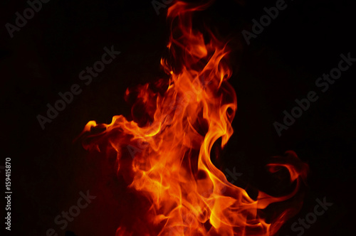 Fire Texture With Motion Blur Effect Over Black Background
