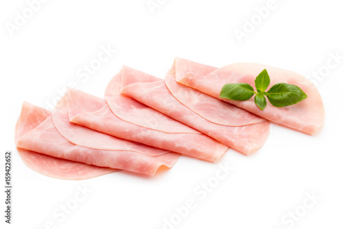 Thin slices of ham on white background.