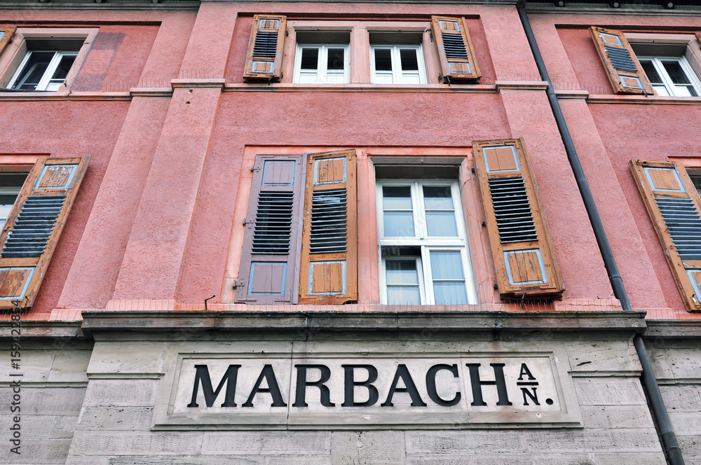 Obraz premium Railway station old building with the name of the city of Marbach. Baden-Wurttemberg, Germany