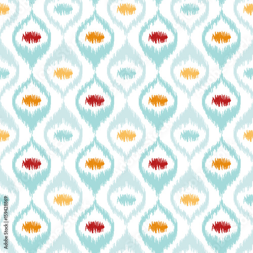 Seamless geometric pattern, based on ikat fabric style. Vector illustration. Carpet rug texture vector imitation. Turquoise mint, yellow orange and red ogee pattern.